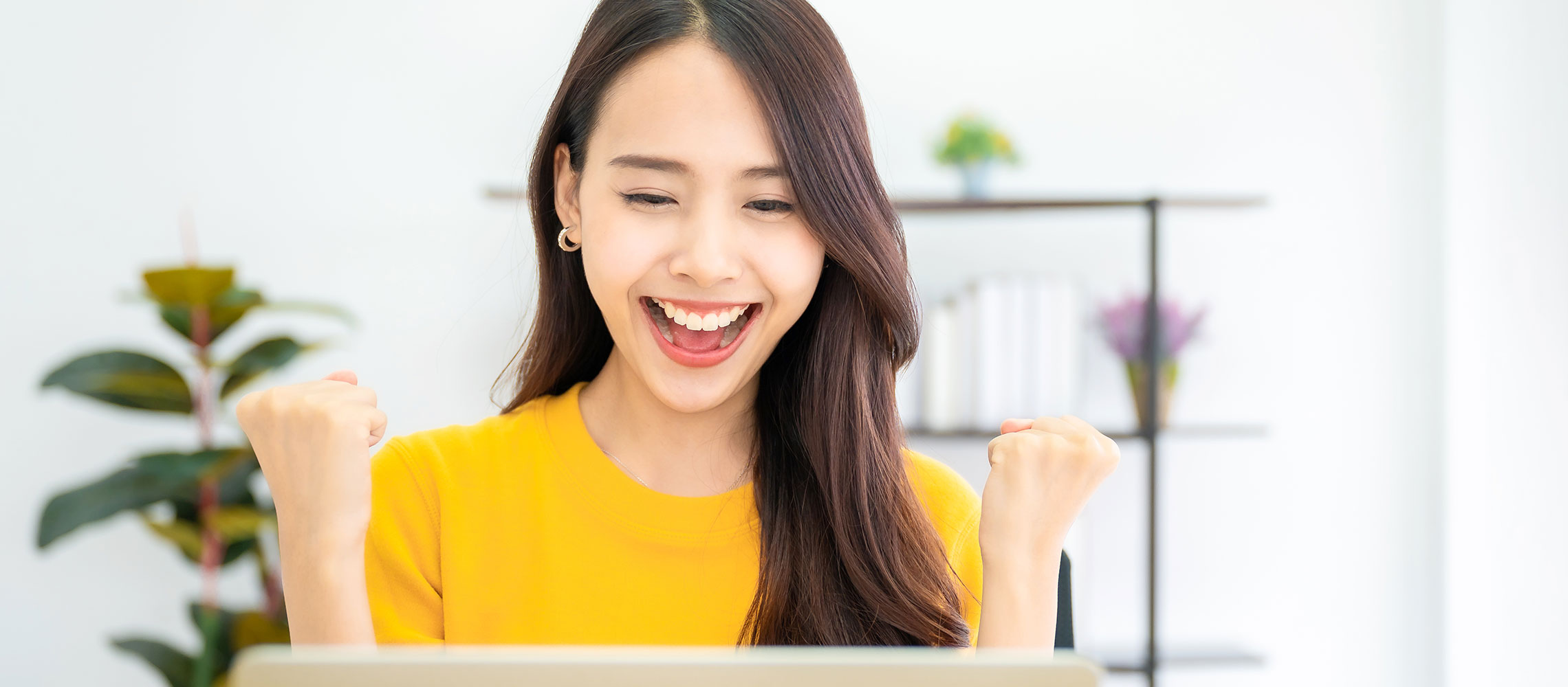 happy woman with laptop